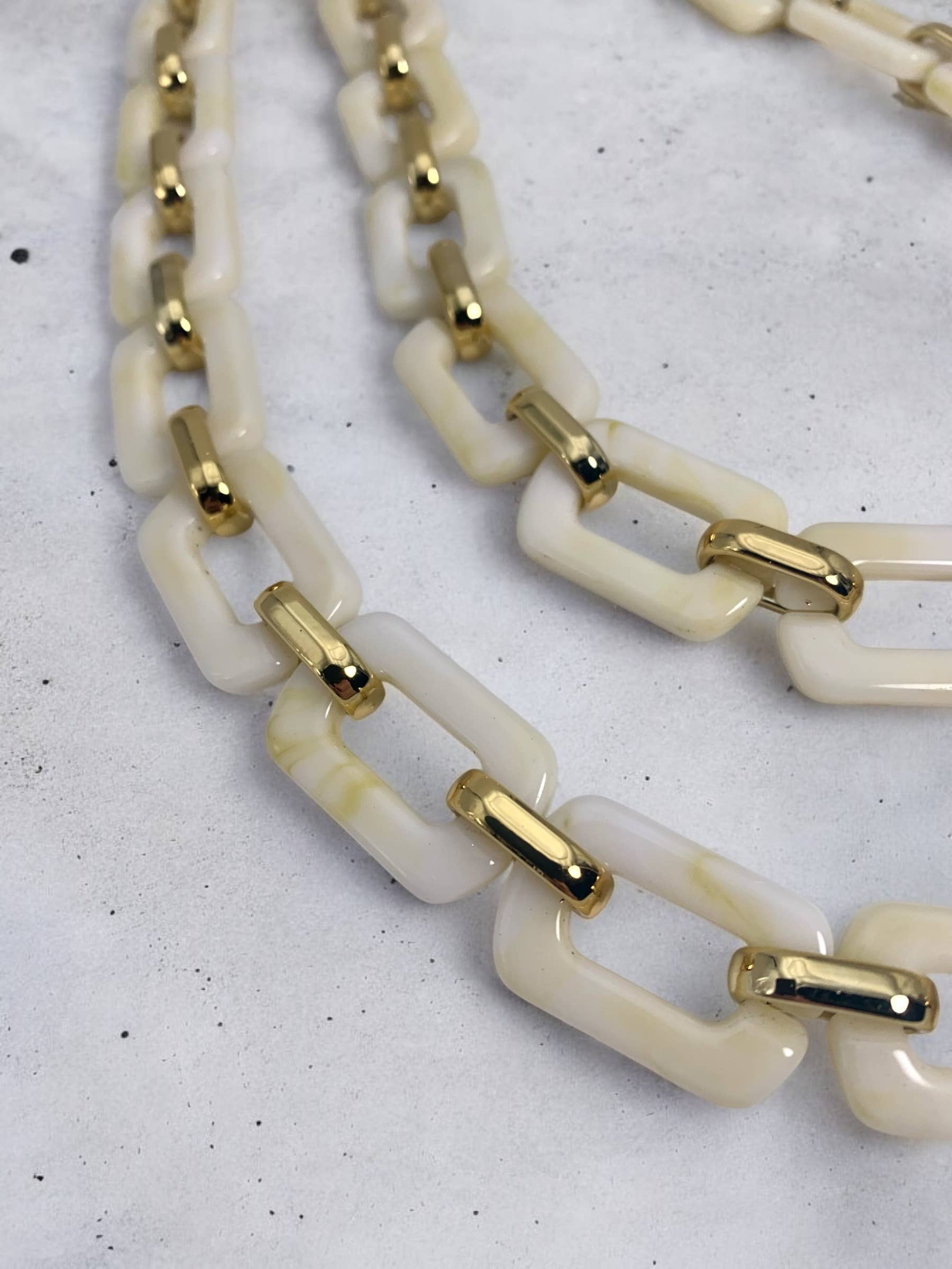 Beige and gold beaded long phone strap