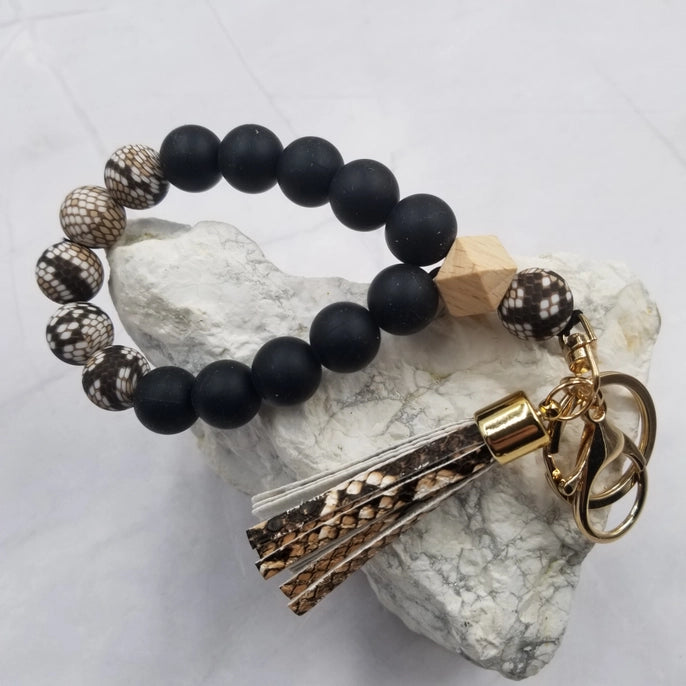 Bracelet en silicone avec porte-clés et perles en forme de serpent