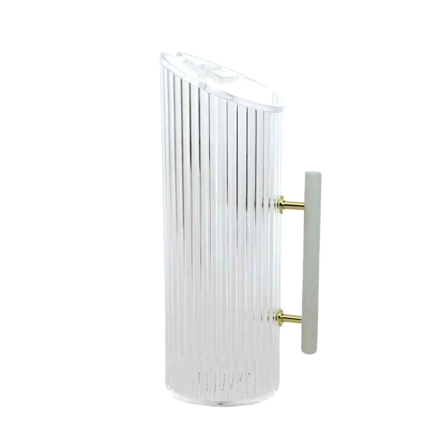 Corrugated lucite pitcher with white leatherette handle