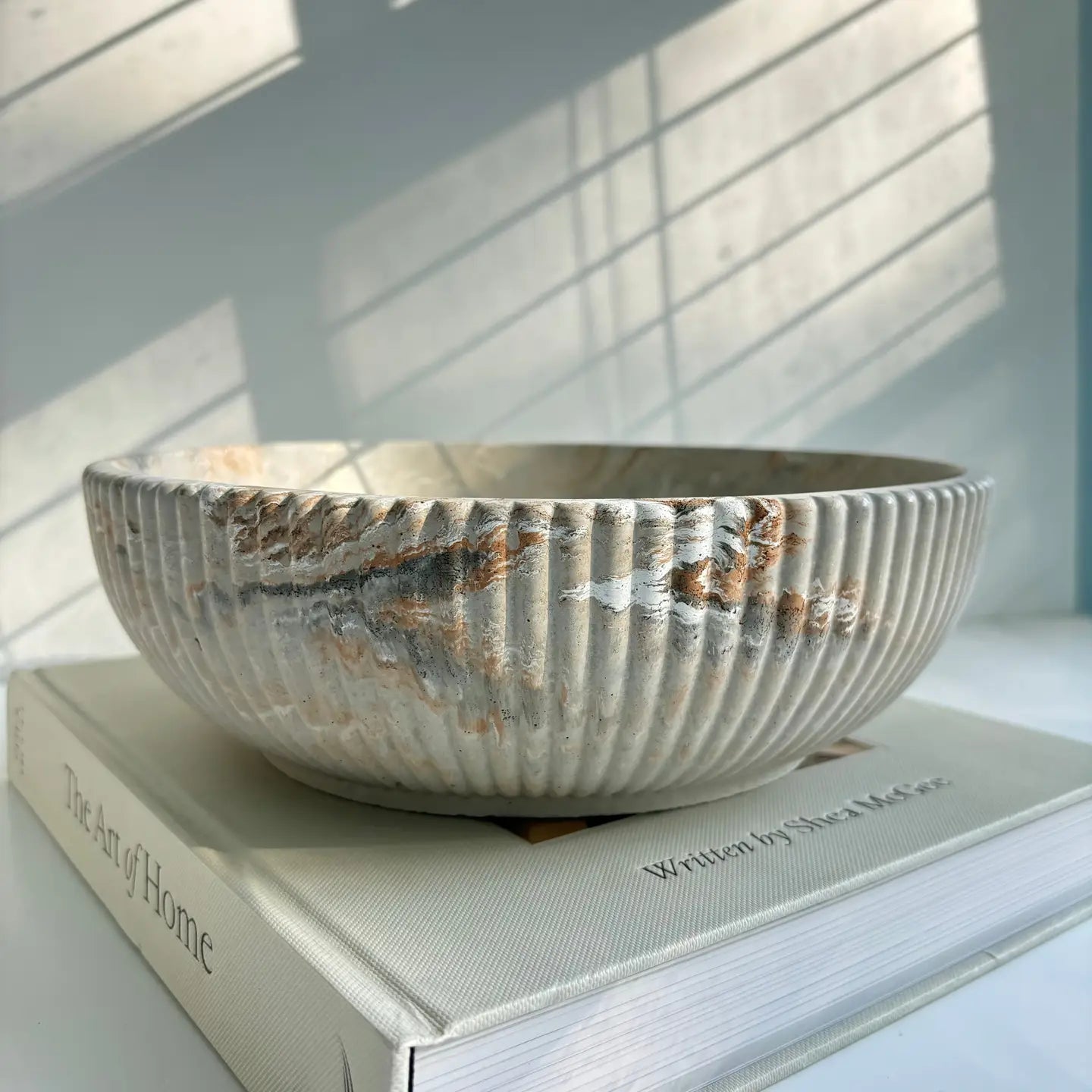 Tan marble concrete fluted bowl