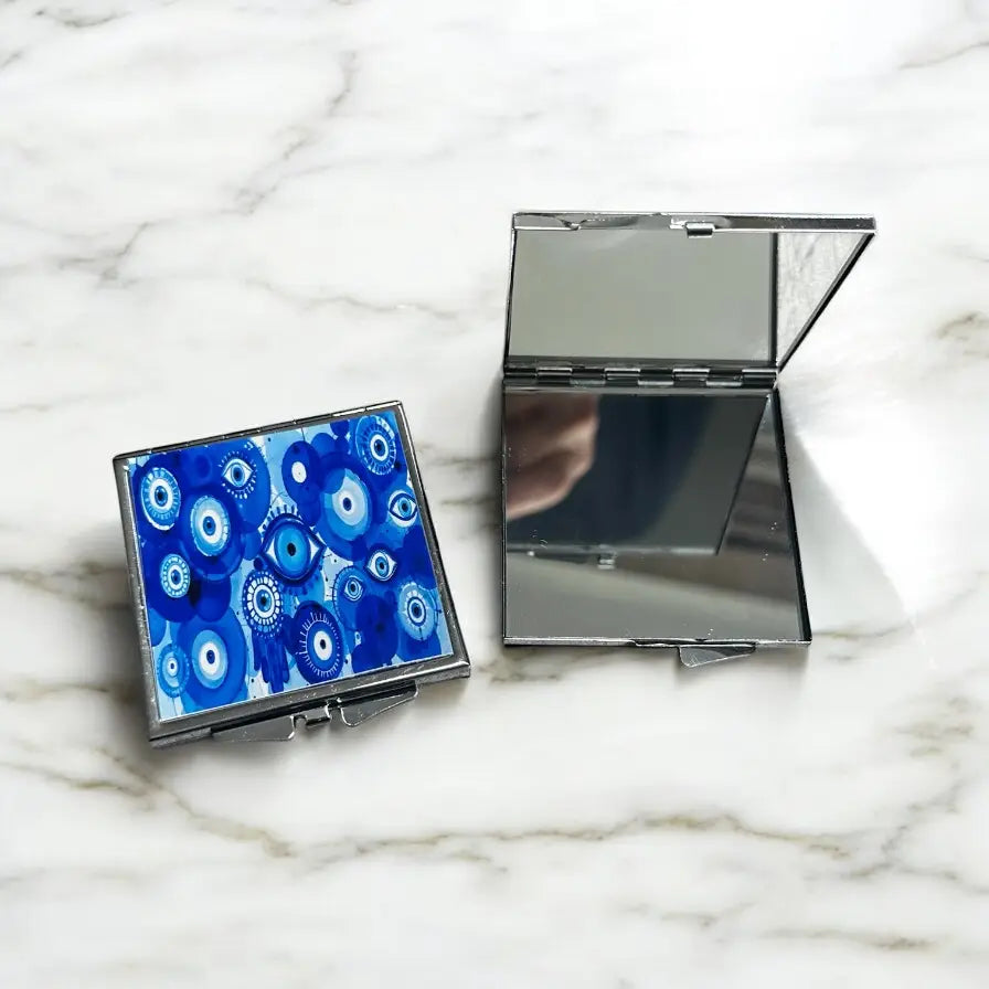 Blue evil eyes Pocket Mirror
