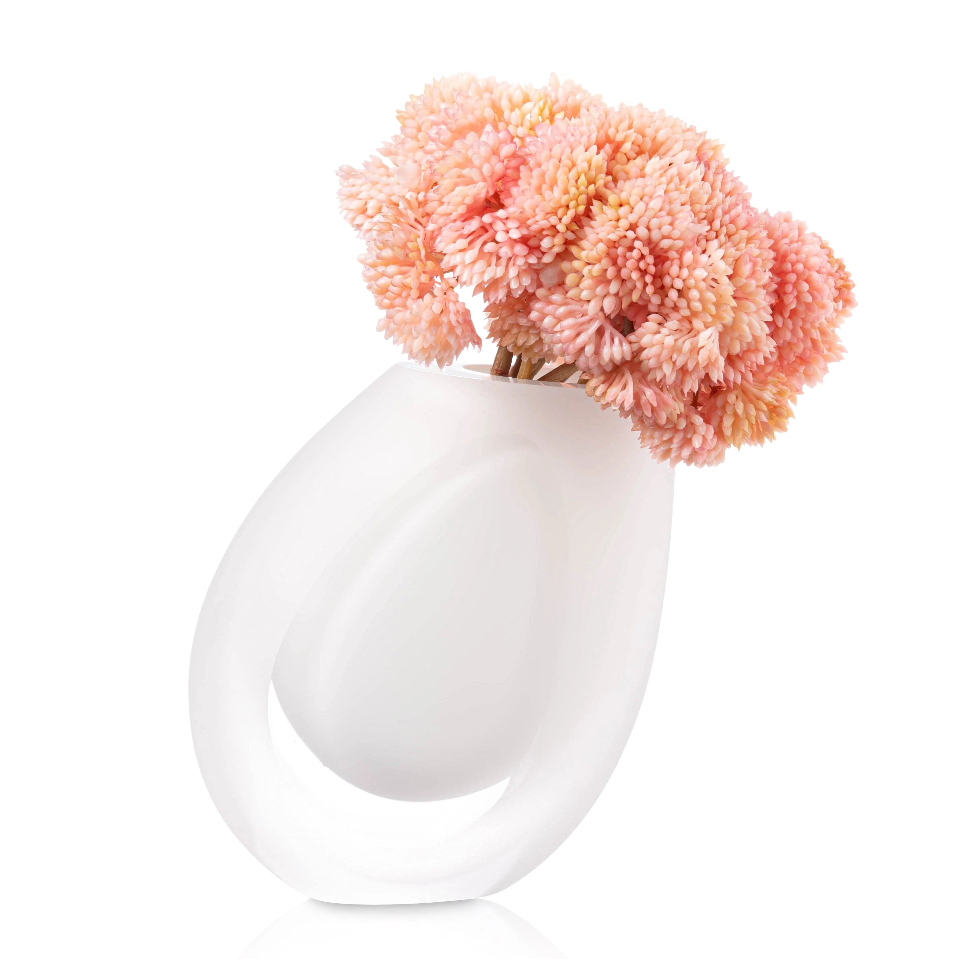 Vase floral blanc incliné avec fleurs blush