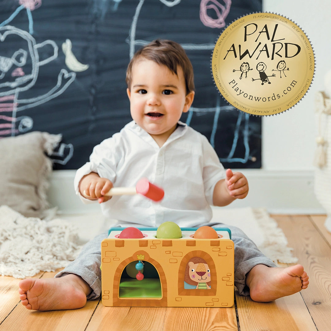 Petit château jouet à piler et à rouler