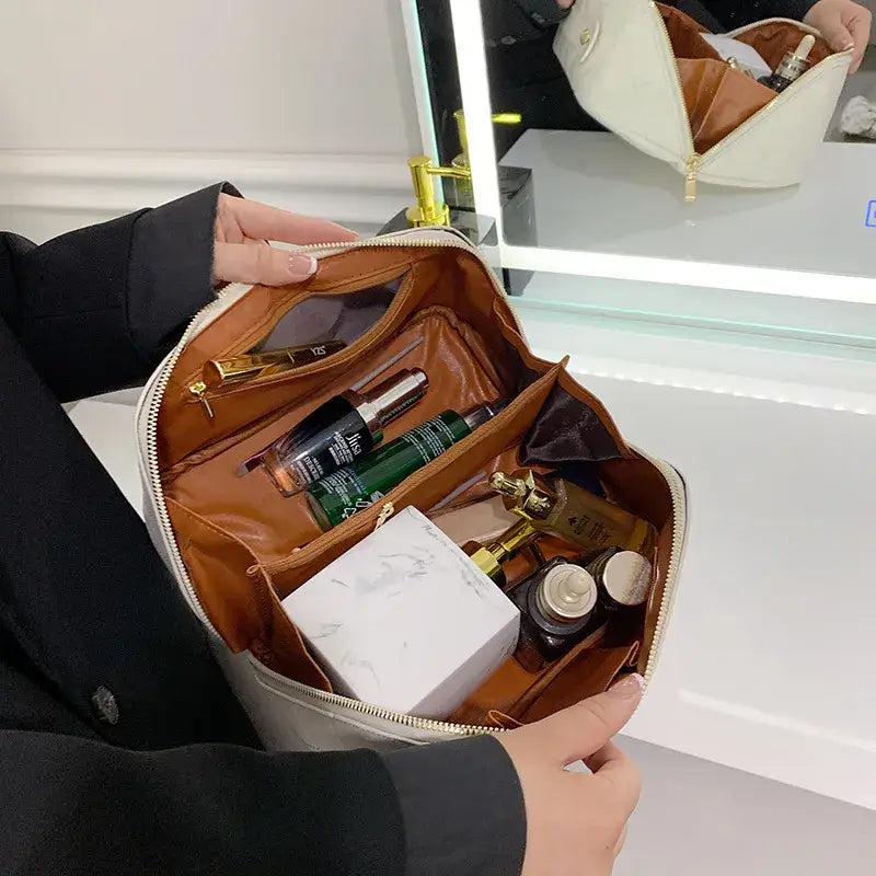 Trousse de maquillage à motif matelassé - blanc cassé