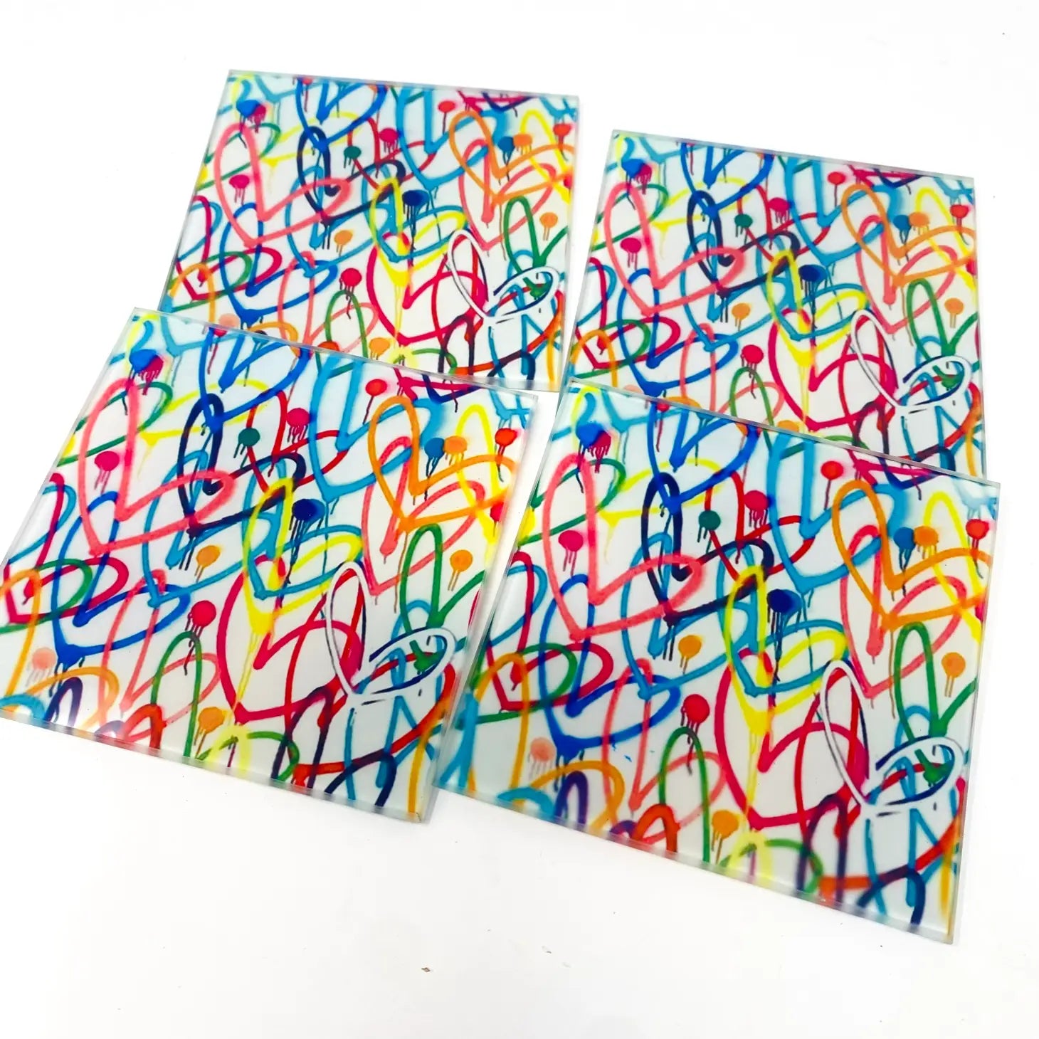 Dessous de verre en forme de cœurs colorés avec graffitis (lot de 4)