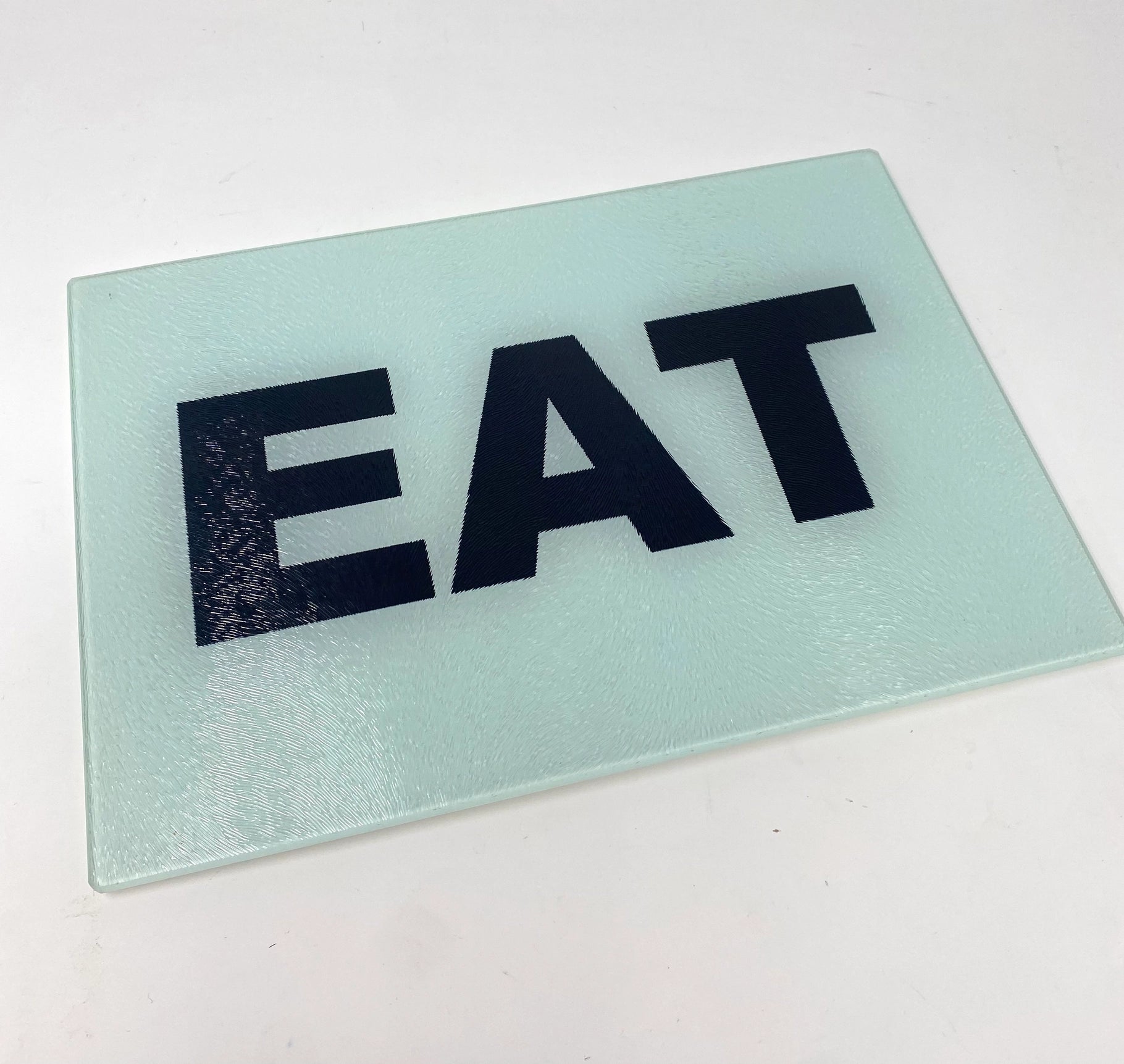 “Eat” glass tray