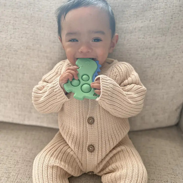 Anneau de dentition en silicone avec bouton-pression sensoriel - Dinosaure vert