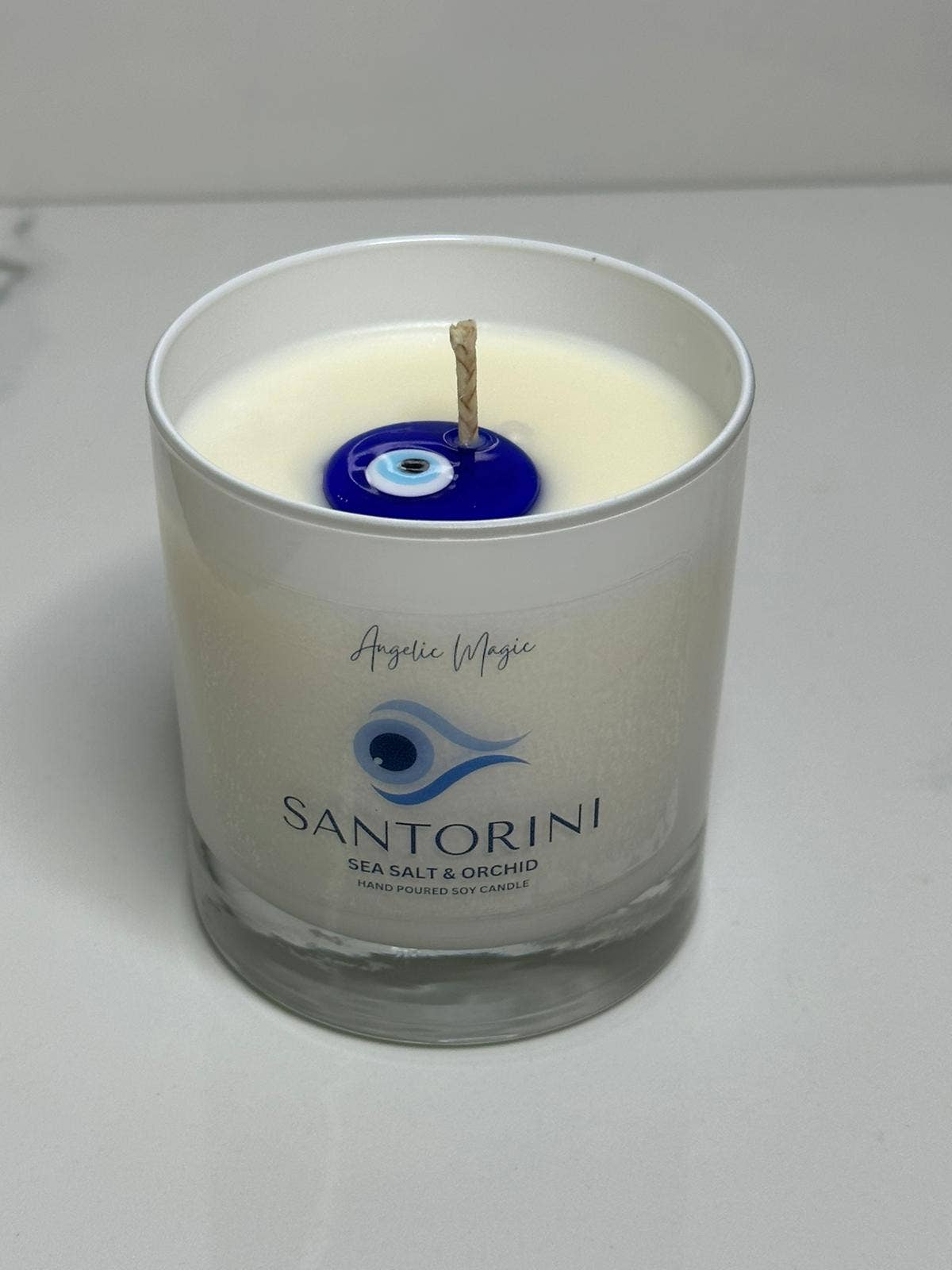 Evil eye Santorini candle