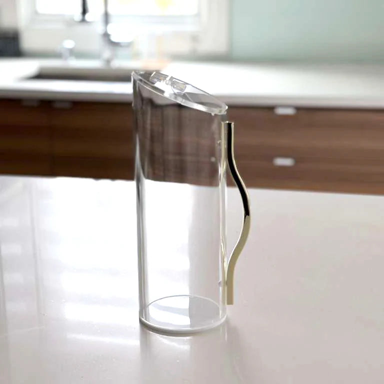 Lucite pitcher with gold wavy handle