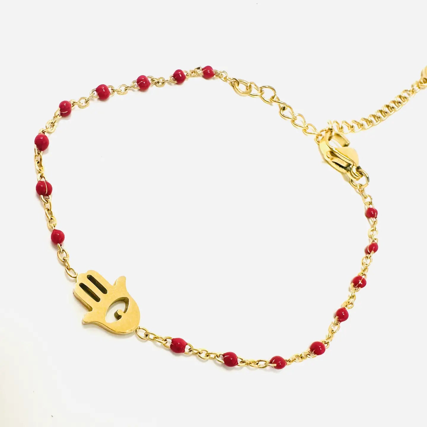 Bracelet en perles dorées Hamsa - rouge