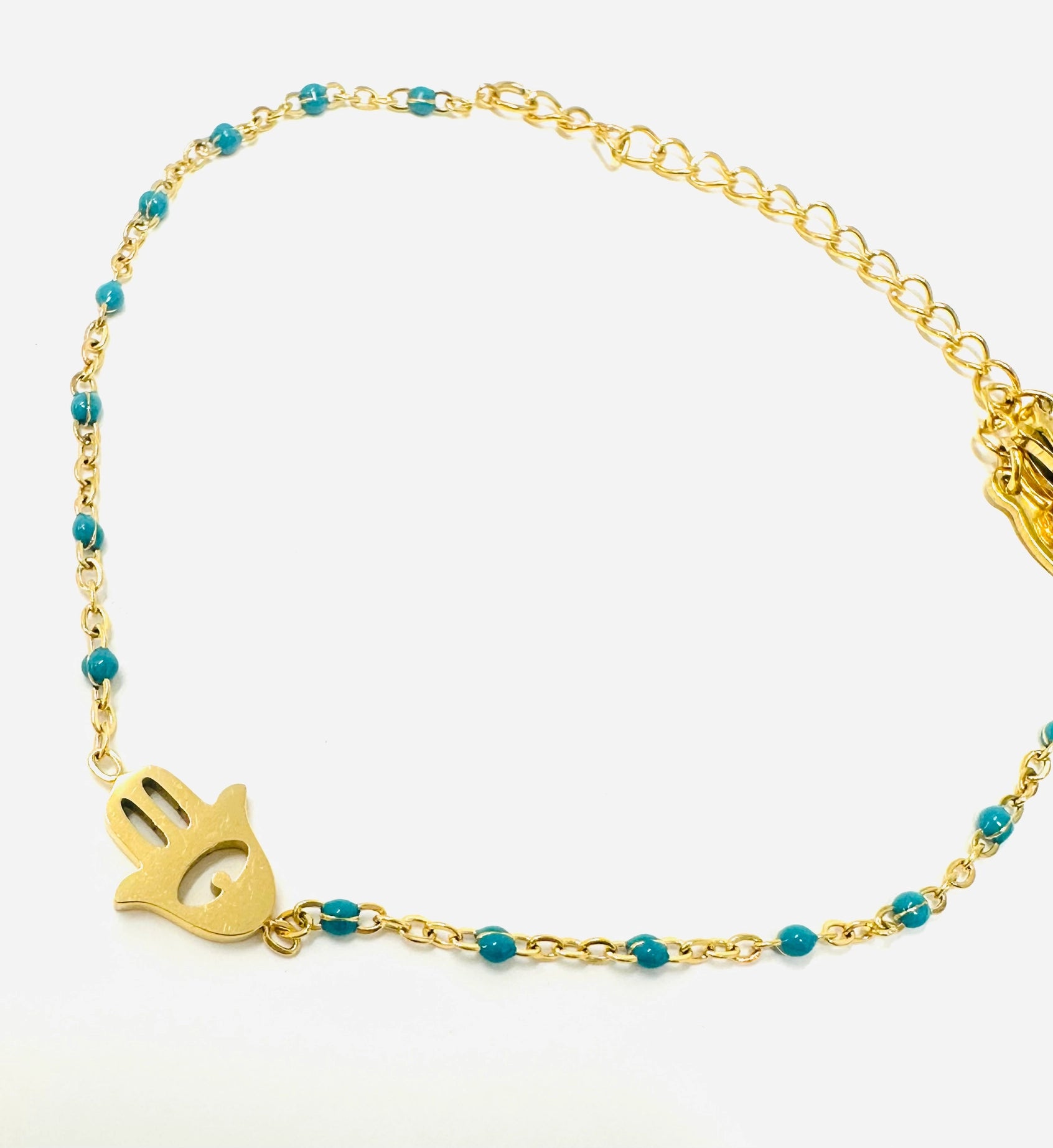 Bracelet en perles dorées Hamsa - bleu